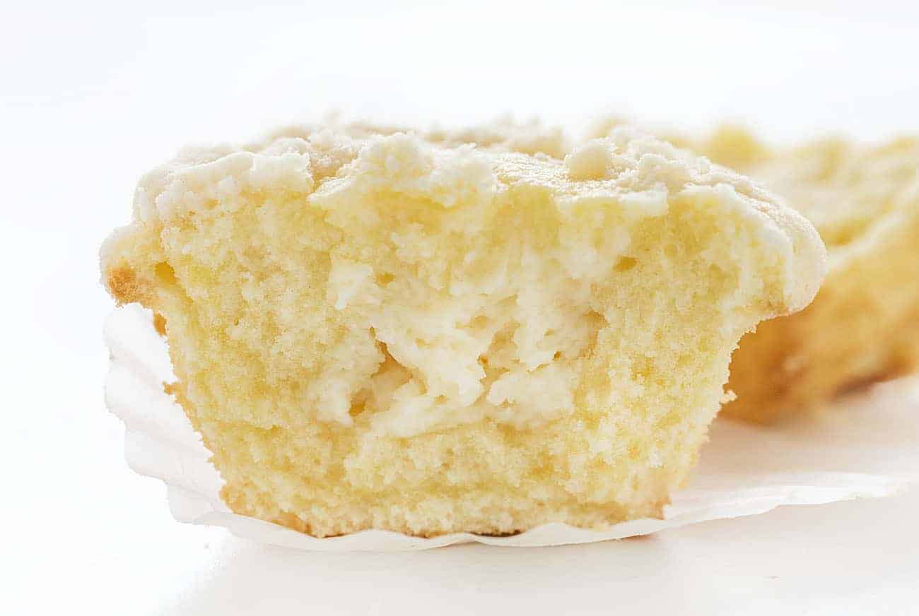 Cream Cheese Muffins are nothing short of perfection. With a cream cheese swirl and a crumb topping, I can almost guarantee that you will be hooked after one bite! Cream Cheese Muffin, Breakfast Muffin, How to Make Muffins, How to Make Cream Cheese Muffins, Easy Muffin Recipe, Recipes, Breakfast Recipes, the best muffins, i am baker Inside of Cream Cheese Muffin